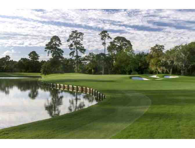 Champions Golf Club - One foursome with carts and range balls