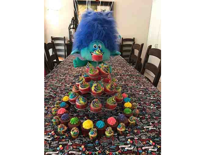 Two dozen homemade-custom cupcakes designed by Catherine Gaston