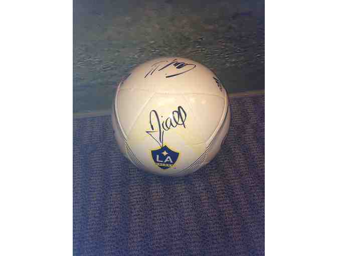 Galaxy ball signed by One Direction members Louis Tomlinson, Niall Horan, and Liam Payne
