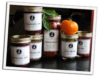 Basket of locally produced jams, pickles and baking mixes from Porchlight Products