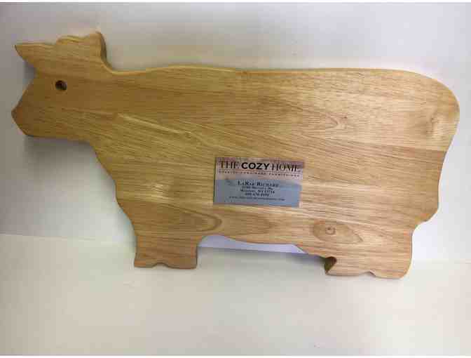 $25 to The Cozy Home & cow-shaped cutting board