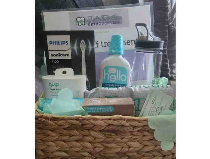 Jade Orthodontics gift basket and certificate for $1,000 off Treatment #2