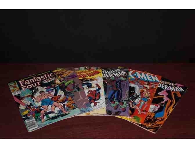 SIX COMIC BOOKS SIGNED BY THE STAN LEE