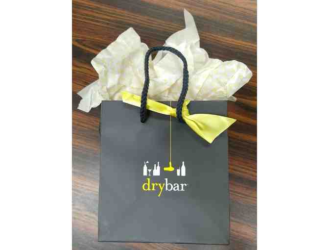 A $50 gift card and a travel set of products from Drybar
