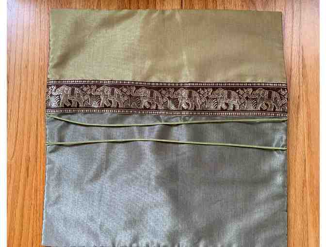 Three silky throw pillowcases with elephant detail