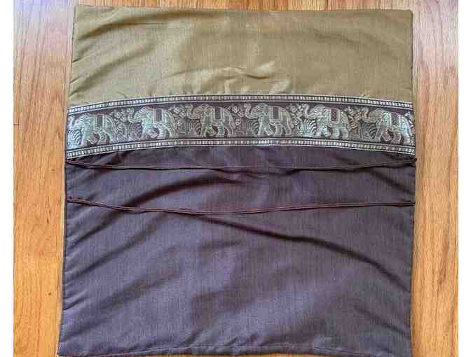 Three silky throw pillowcases with elephant detail