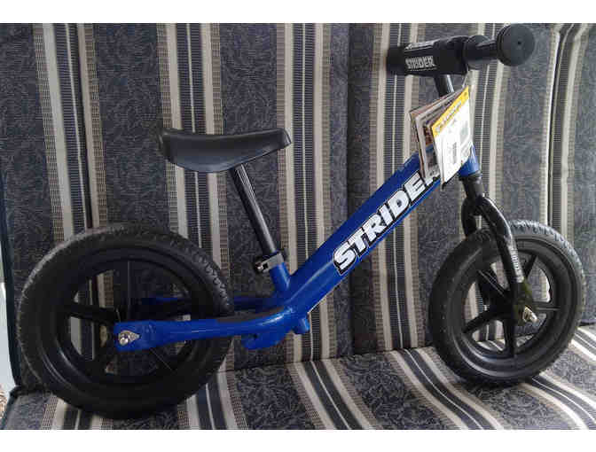 Child's Blue Strider bike - Photo 1