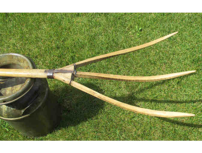 5-gallon milk can and antique, hand-made wooden pitch fork