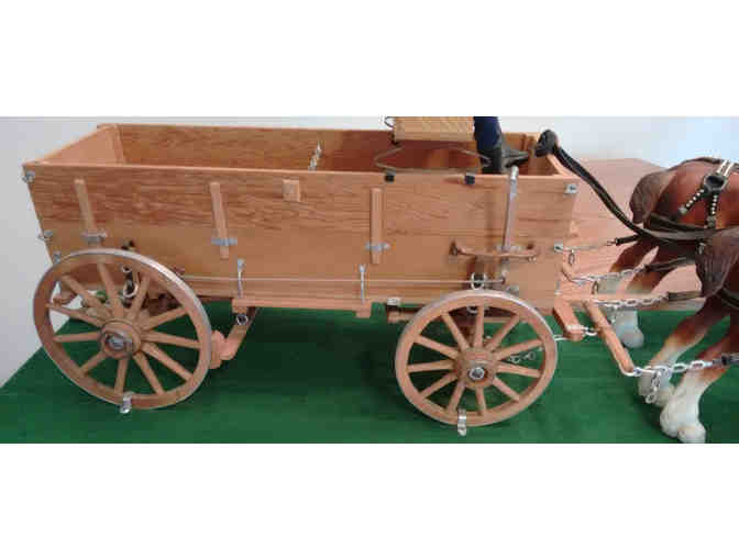 Hand crafted model farm wagon with four horses