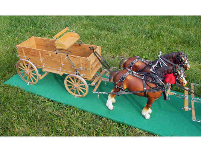 Hand crafted model farm wagon with four horses