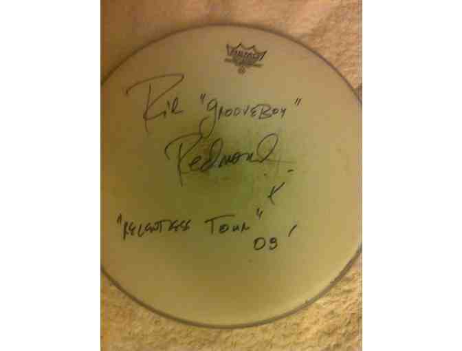 Rich Redmond t-shirt, stickers, and autograph drum pad