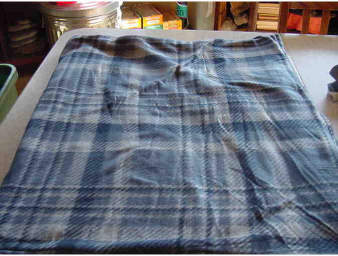 Fleece blanket, dog treats and dog toy