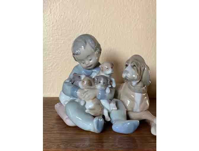 Lladro Boy with Puppies