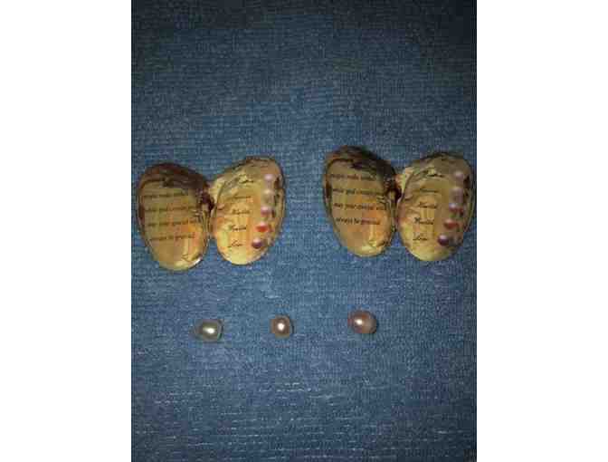 Three cultured pearls