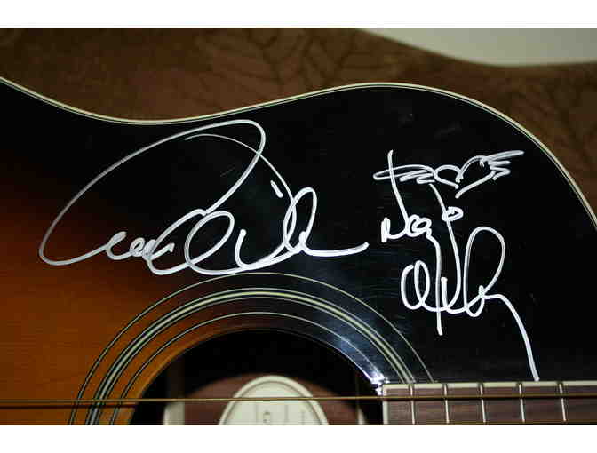 Bring Lolita Home/Fragile Waters Heart Autgraphed Guitar.
