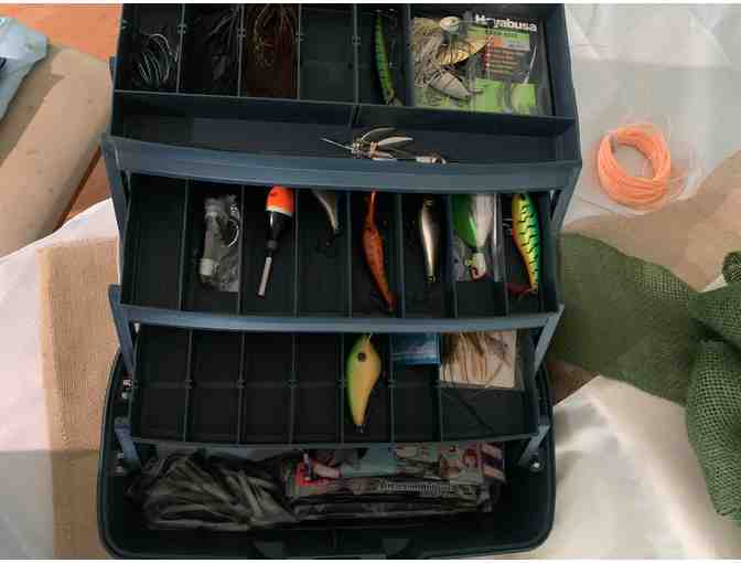 a Tackle box with assorted tackle