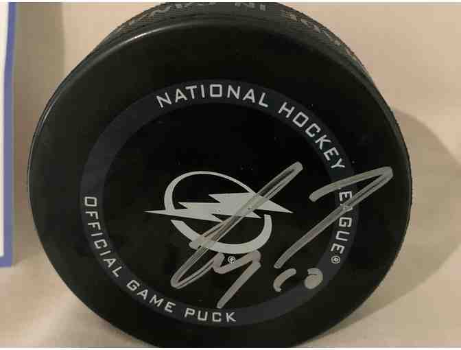 a Corey Perry Autographed Game Puck