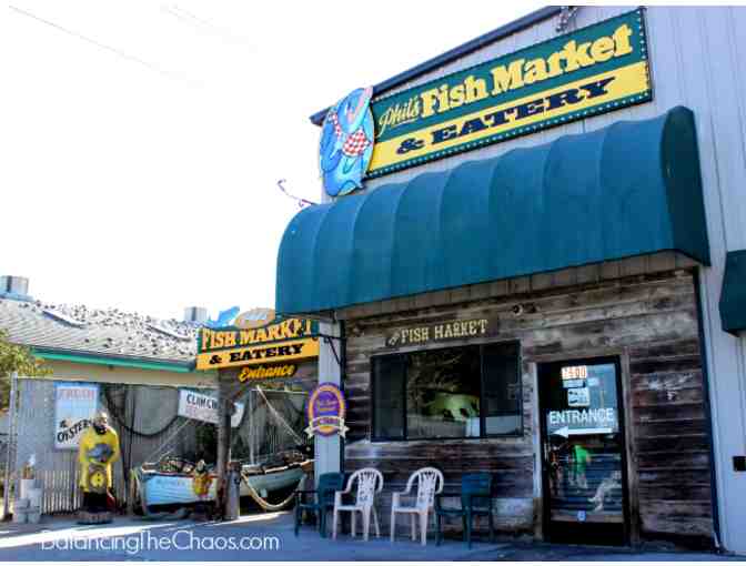 214. Two $50.00 gift certificates to Phil's Fish Market for Dining