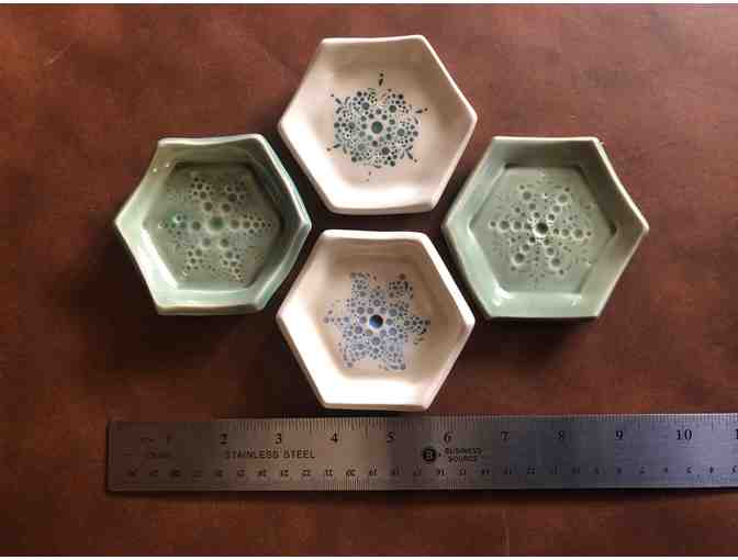 Four Sea Urchin Pottery Plates