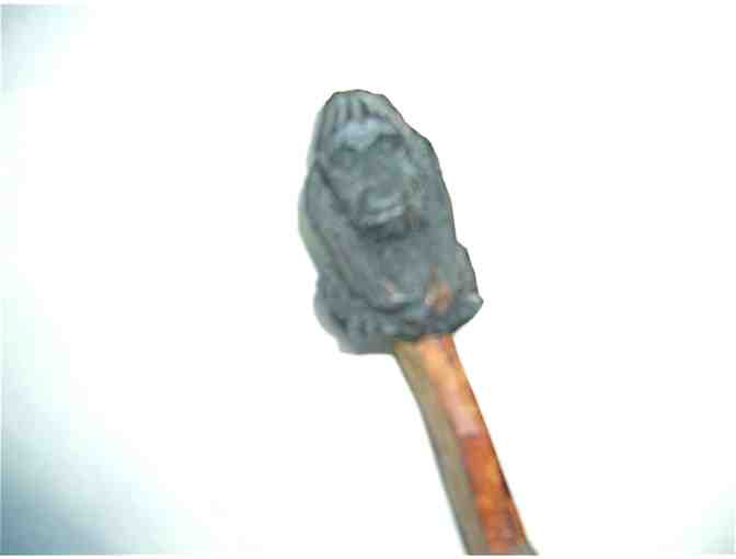Wooden carved letter opener adorned with carved gorilla