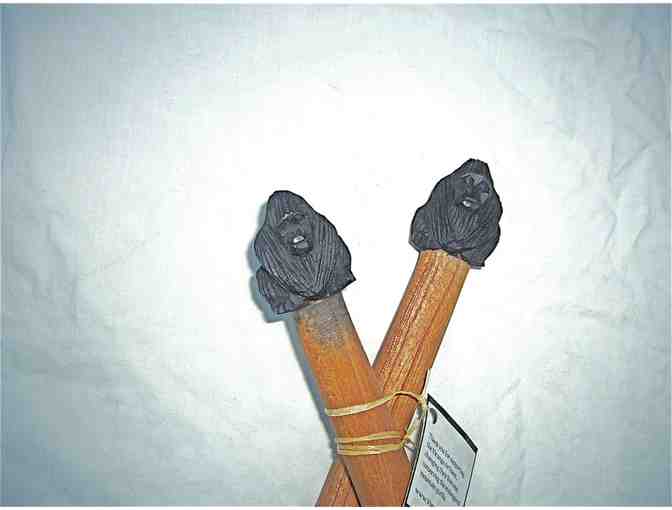 Hand-carved Mountain Gorilla-adorned salad servers from Rwanda