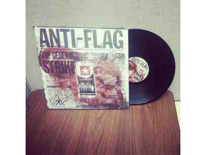 ANTI-FLAG 12" Signed Vinyl Record & 14'' Autographed Drum Head Set!