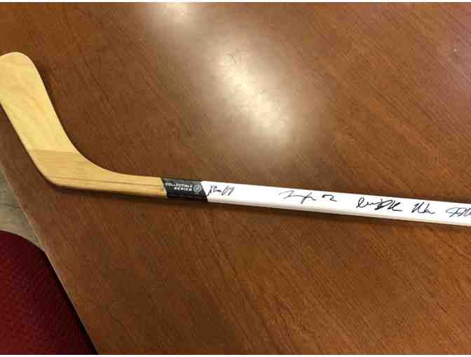 Boston Bruins tickets, zamboni ride, and signed stick
