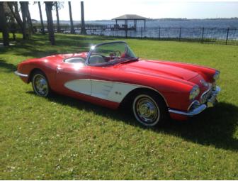 Notch up your cool when you drive this classic 1960 red convertible Corvette!