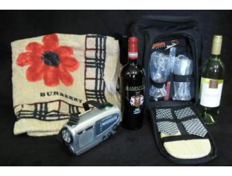 Romantic picnic outing for two, with picnic bag, wine (2), beach towel, and crank radio.