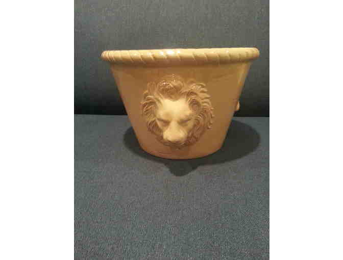 Ceramic yellow pot with lion figures