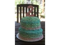 Lovely Little Cakes, Lamorinda: One 9" birthday cake and one dozen matching cupcakes.