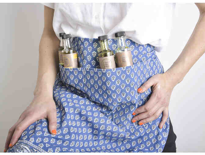 Basket of gourmet cooking and skincare oils