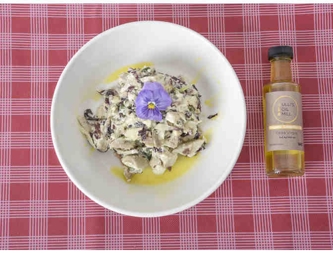 Basket of gourmet cooking and skincare oils