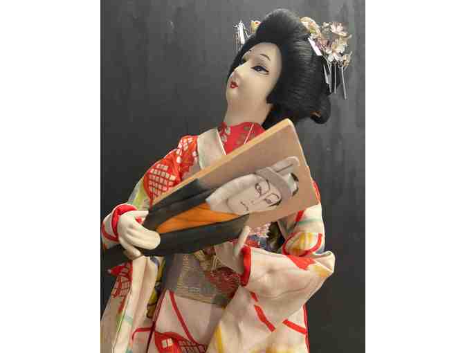 Vintage Japanese Doll holding a 'Haoita' (Paddle)
