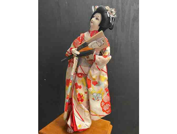 Vintage Japanese Doll holding a 'Haoita' (Paddle)