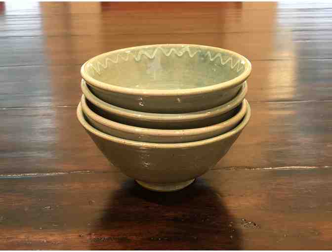 Set of 4 hand-made ceramic turquoise bowls