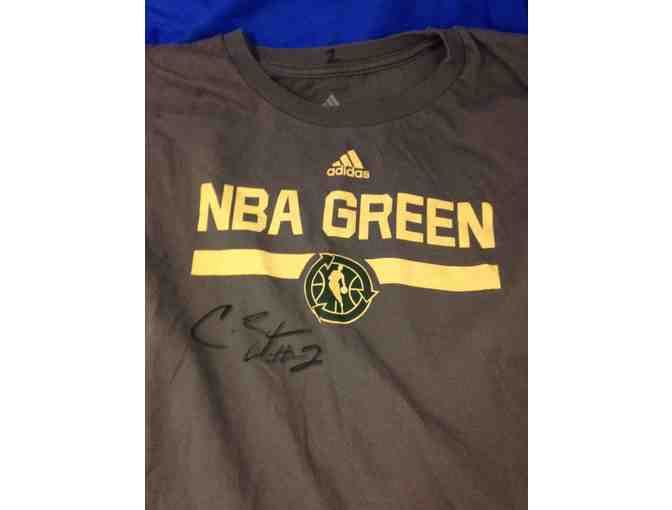 2014 Caron Butler worn and autographed NBA Green Week shooting shirt