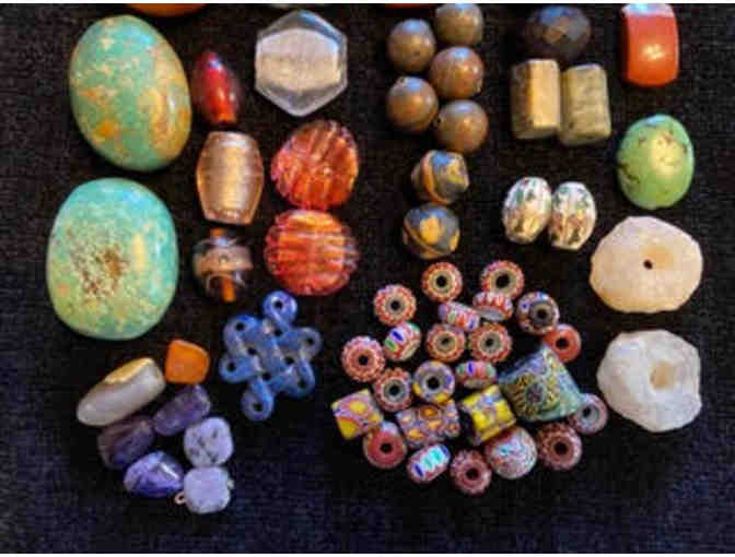 Different Sizes, Shapes, Colors, and Materials of Beads Waiting to be Strung