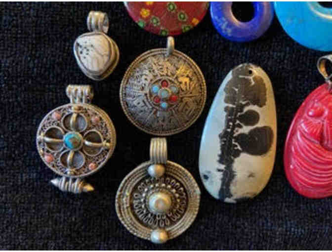 Fourteen Pendants of Varied Sizes, Shapes, Materials and Colors