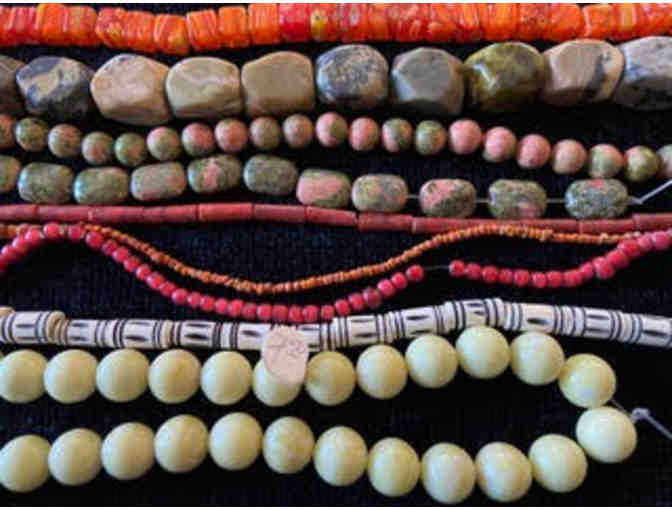 Assortment of Various Colors and Materials of Beads