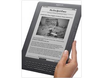 Amazon Kindle DX (Slightly used) with black leather case
