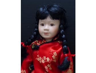 CHINESE DOLL WITH TEA SET