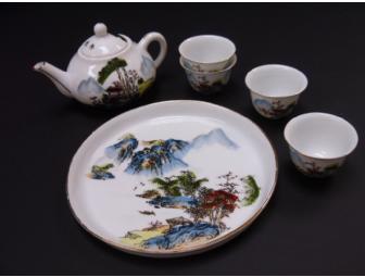 CHINESE DOLL WITH TEA SET