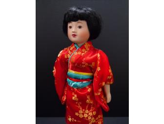 JAPANESE DOLL WITH BOOK