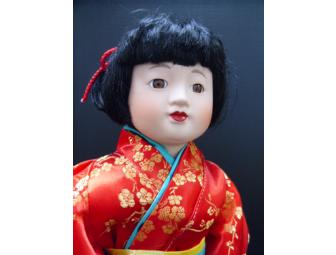 JAPANESE DOLL WITH BOOK