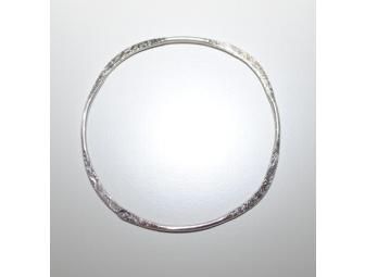 Sterling silver, hand-formed bangles by Jody Stokes