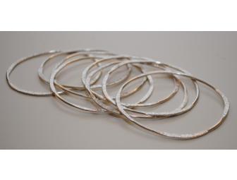 Sterling silver, hand-formed bangles by Jody Stokes