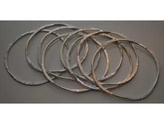 Sterling silver, hand-formed bangles by Jody Stokes