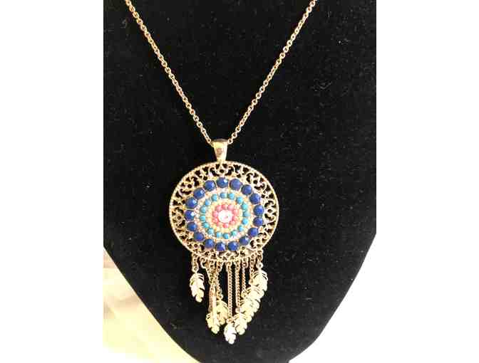 Gold tone feather necklace with blue/turquoise and pink stones