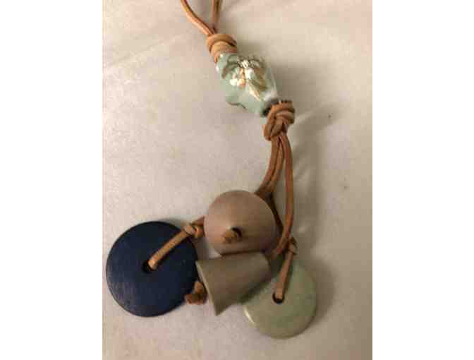 Beautiful Leatherlike necklace with wooden beads